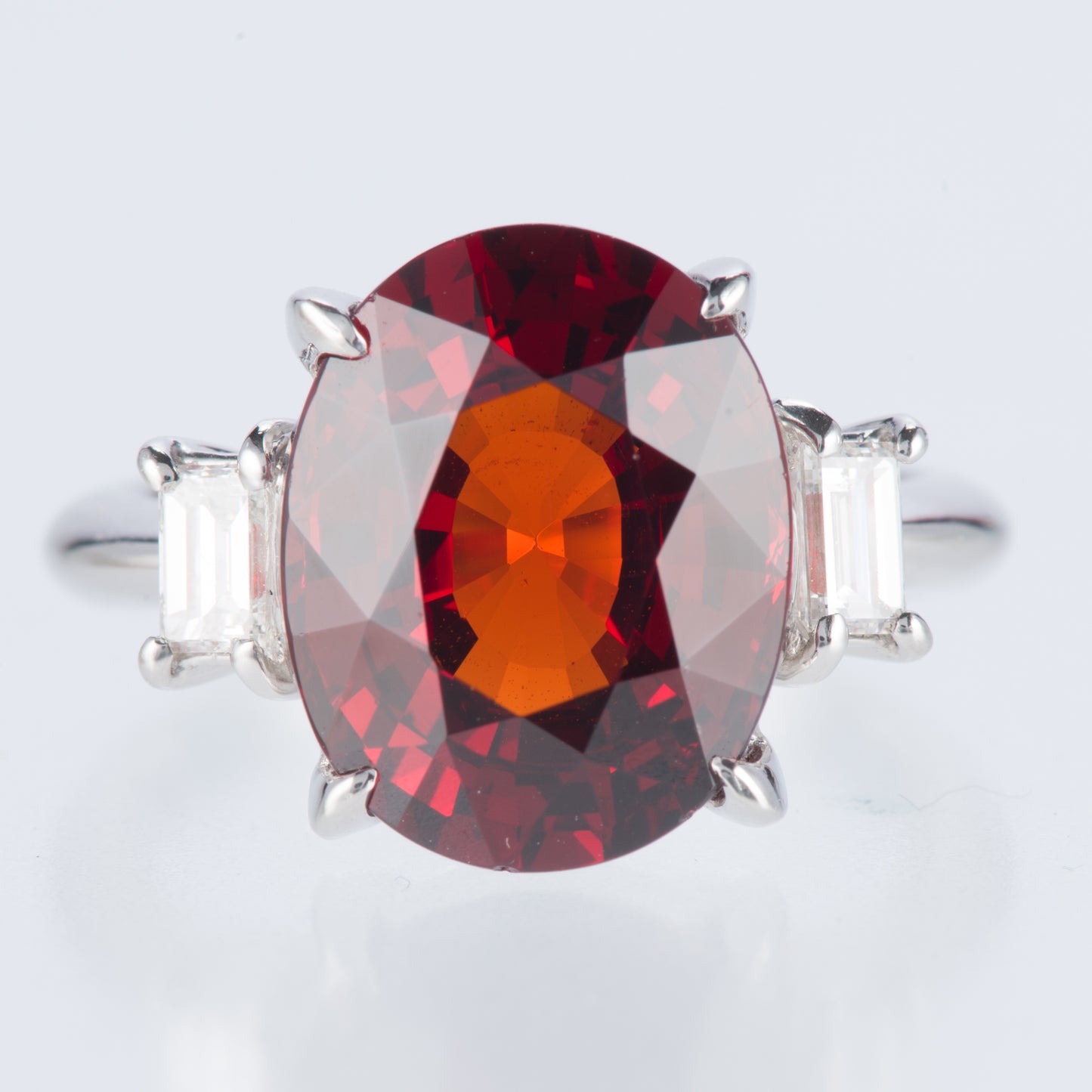 スリーストーン スぺサルティンガーネット x ダイヤモンド プラチナリング SG: 7.71 ct D: 0.38ct Pt900