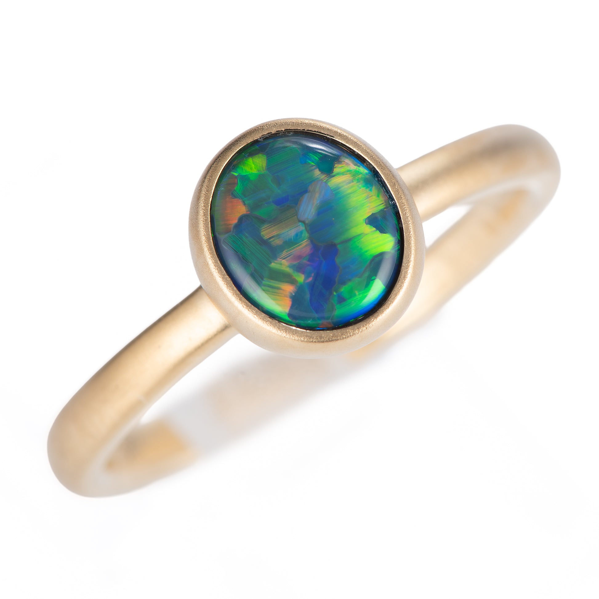 ポイント ブラックオパールイエローゴールドリング O: 0.66ct K18YG