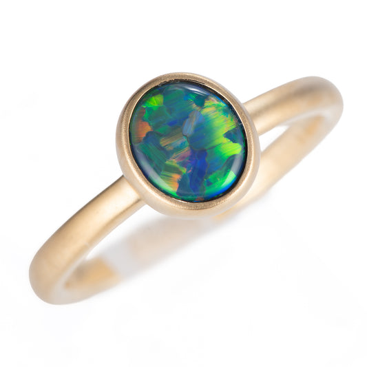 ポイント ブラックオパールイエローゴールドリング O: 0.66ct K18YG