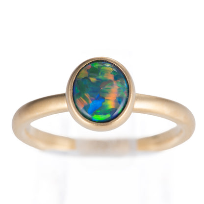 ポイント ブラックオパールイエローゴールドリング O: 0.66ct K18YG