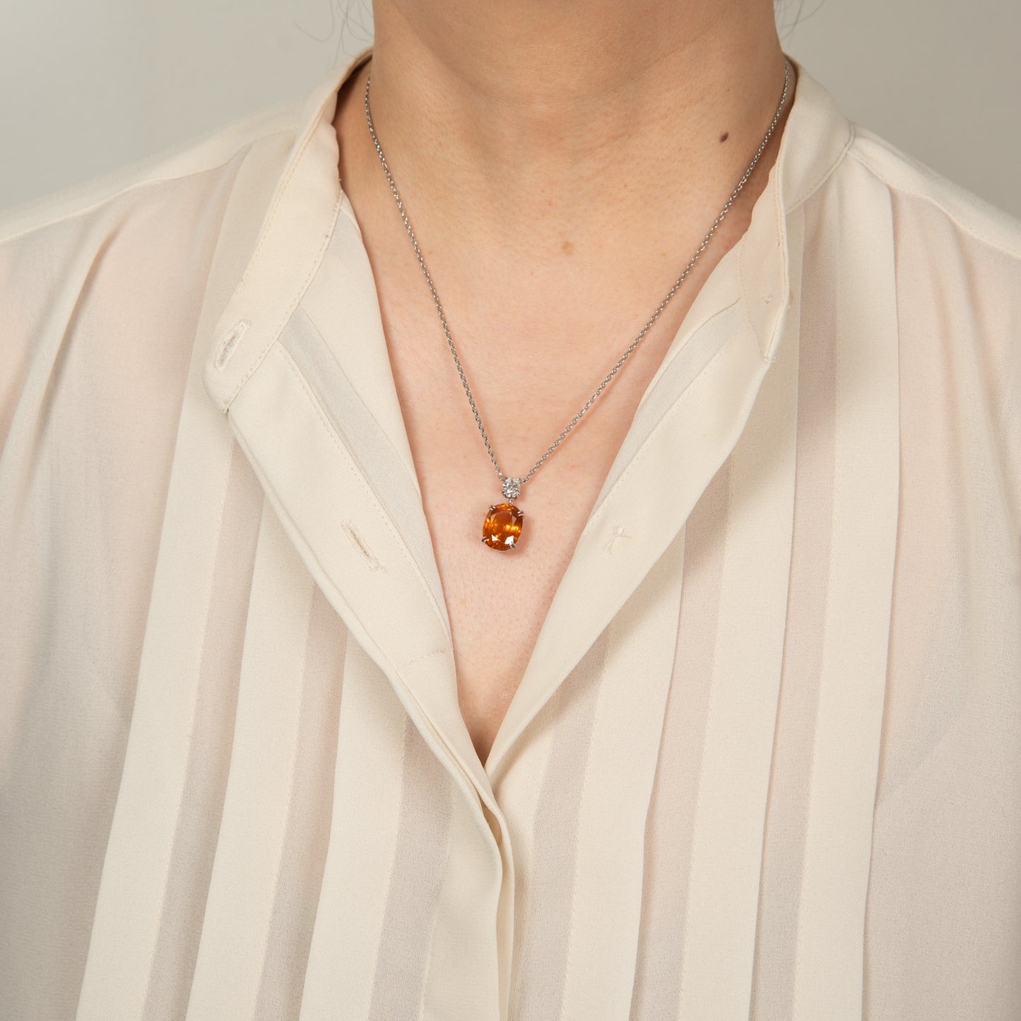 6ct オレンジサファイアxダイヤモンド プラチナ製ペンダント(OS:6.82ct D:0.41 Pt900/K18)