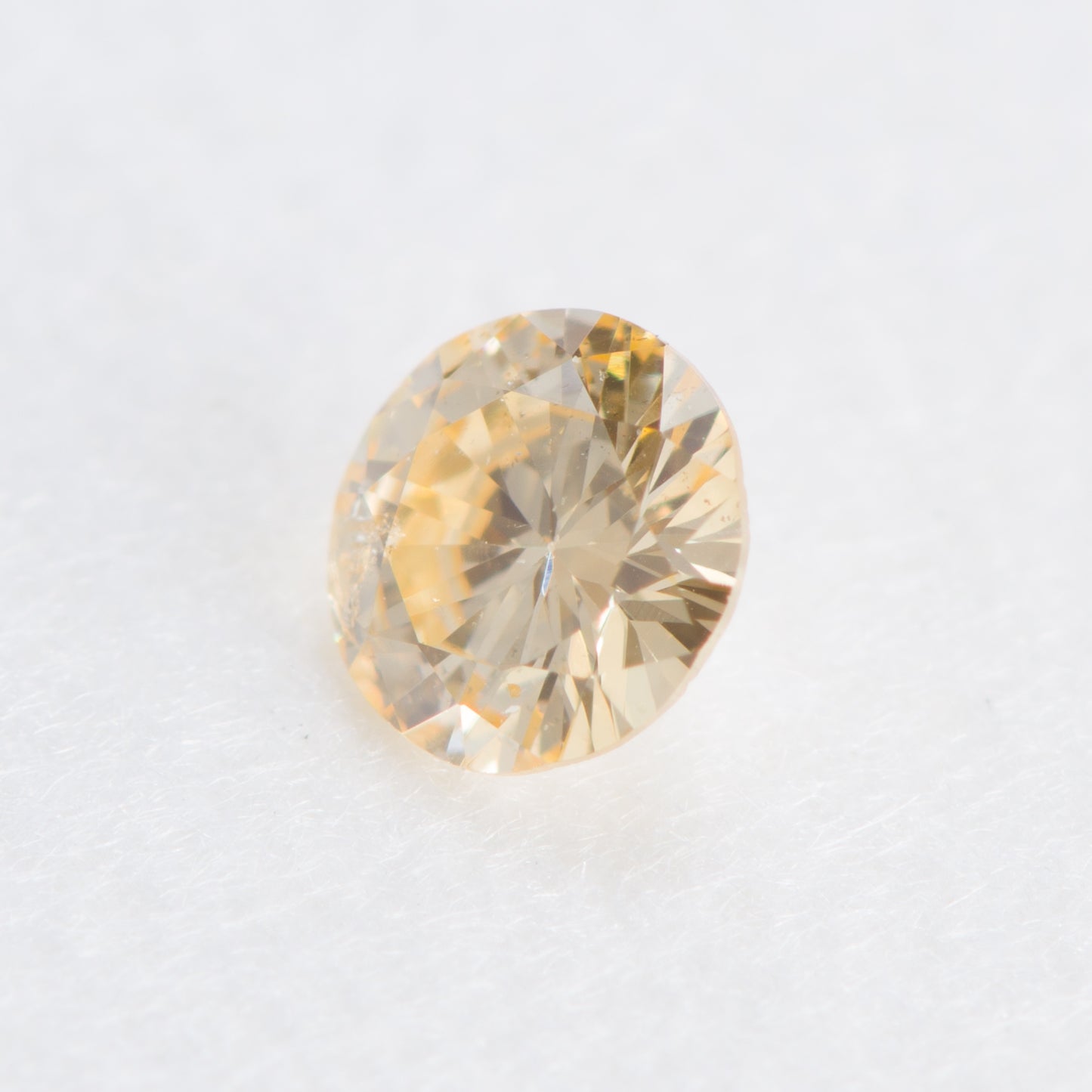 0.100ct, ファンシーライトオレンジイエローダイヤモンド, SI2, ラウンド, CGL