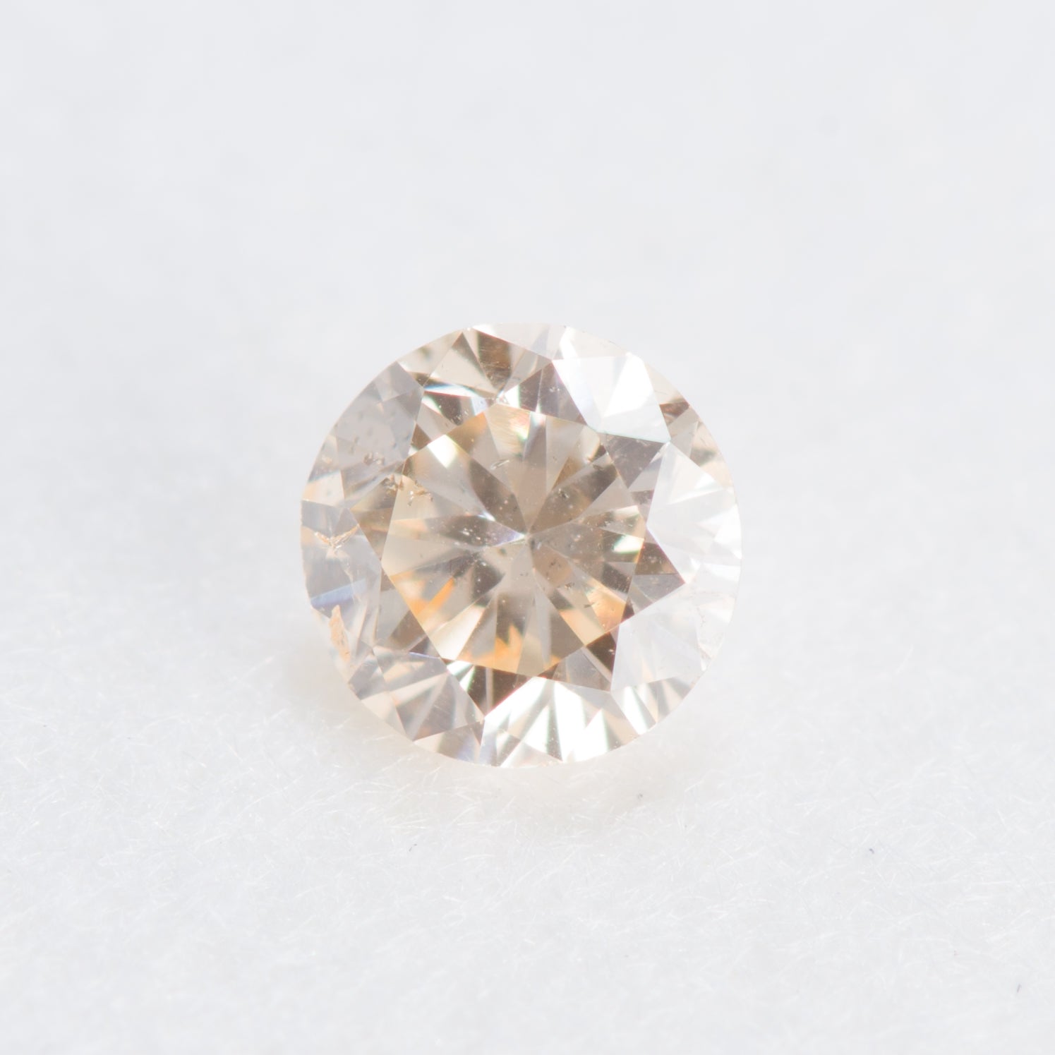 0.108ct, ファンシーライトイエロウィッシュオレンジダイヤモンド, SI2, ラウンド, 中央宝石研究所(CGL)