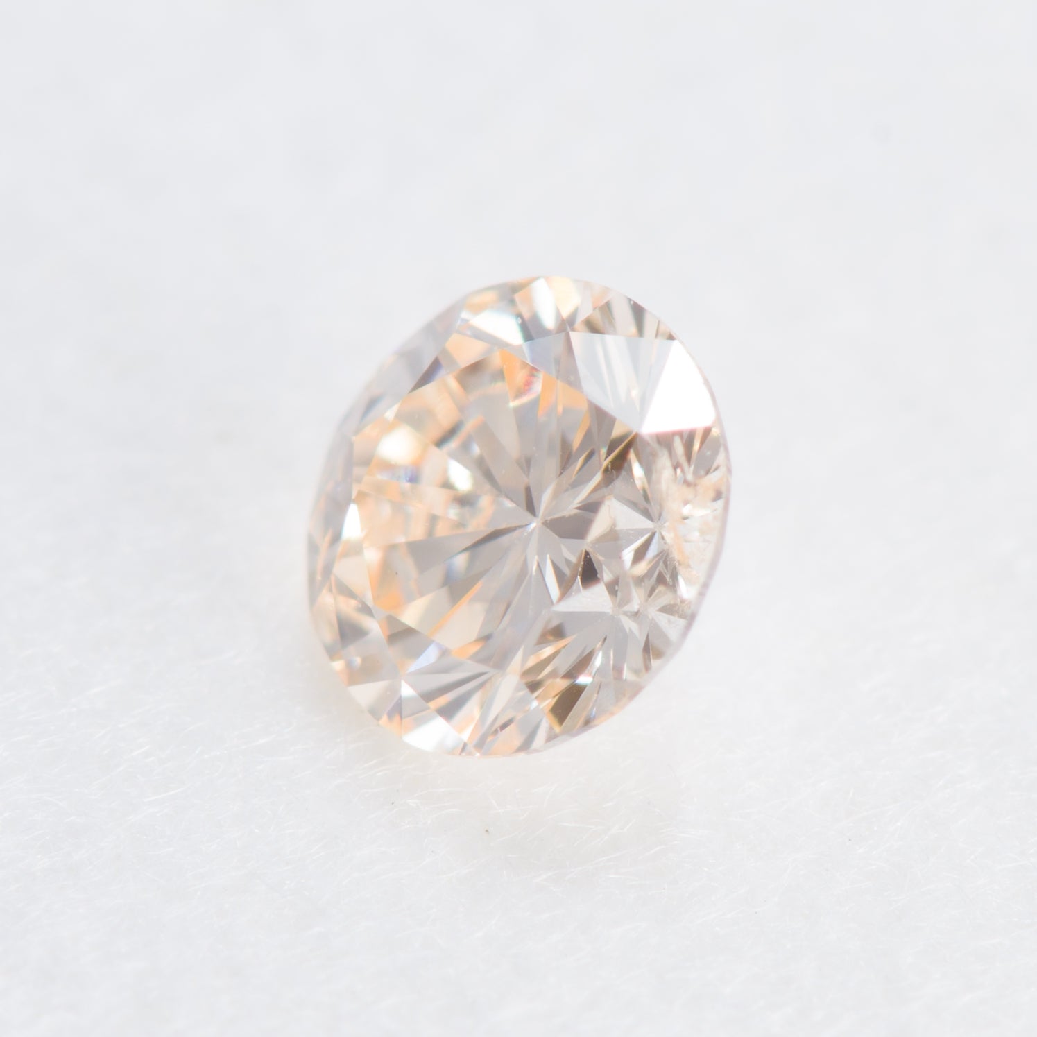 0.146ct, ライトイエロウィッシュオレンジダイヤモンド, SI2, ラウンド, 中央宝石研究所(CGL)